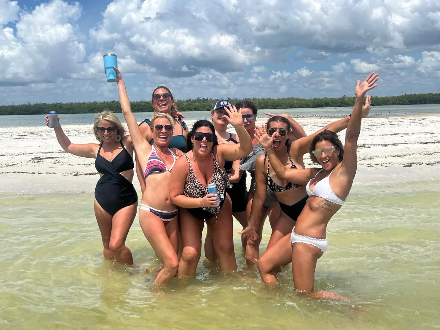 Family enjoying clear water during a Sanibel and Captiva island excursion