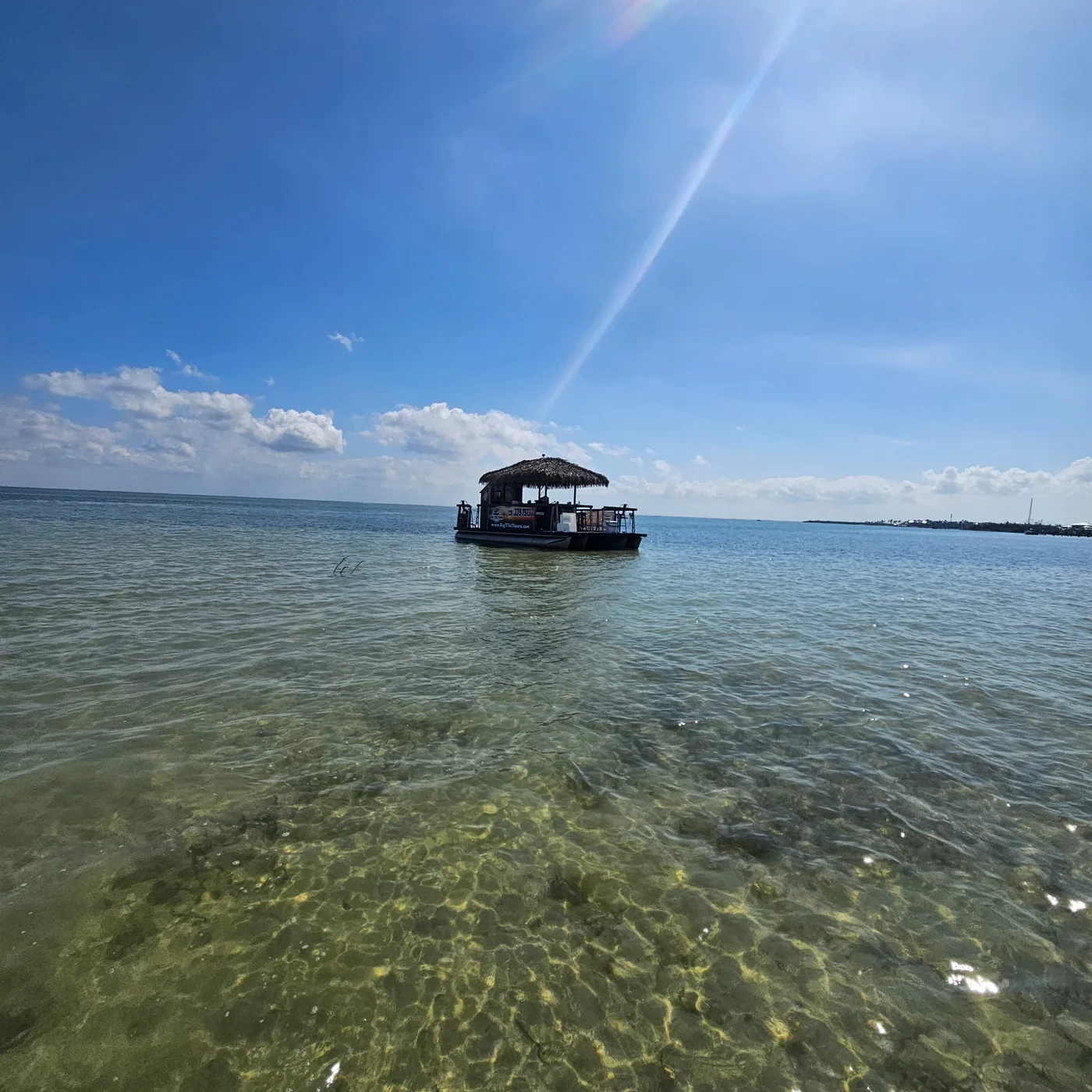 Clear shallow Southwest Florida water viewed from a Big Tiki boat