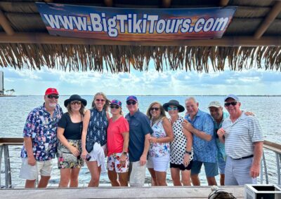 Group enjoying a tiki boat tour in Cape Coral