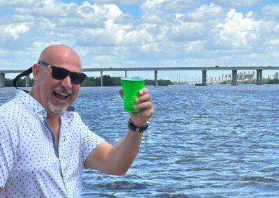 BYOB tiki boat tour setup with cooler and drinks onboard