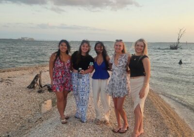 Guests taking photos on a tiki boat tour