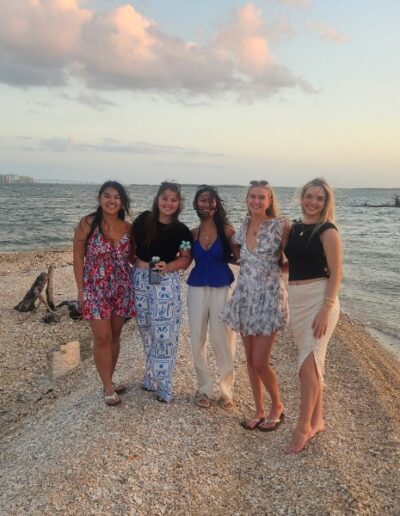 Guests taking photos on a tiki boat tour