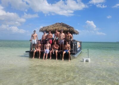 Friend group on a tiki boat charter in Cape Coral